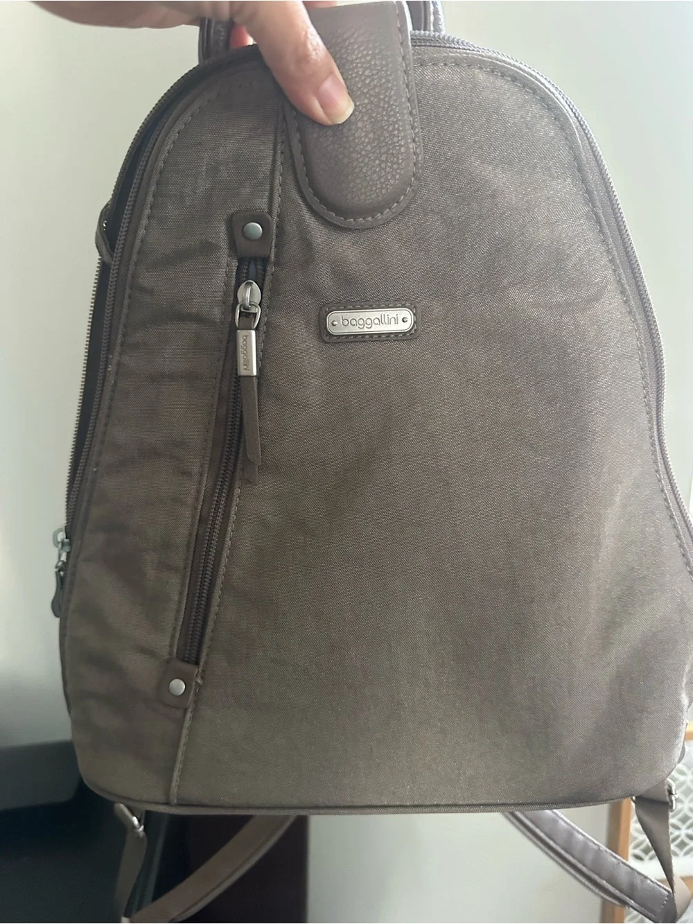 Baggallini Taupe Sling Backpack with Front Zip Pocket travel bag